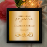 Custom Golden 50th Wedding Anniversary Gift Wooden Box<br><div class="desc">Create a personalized elegant gift box by adding the couple's names and wedding anniversary date. This faux gold gradient background is not real foil, but a stylish golden tone. All the modern typography is editable. "Celebrating 50 years" would be the perfect quality gift box for a golden 50th wedding anniversary....</div>