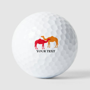 Custom golf balls with two camel silhouettes