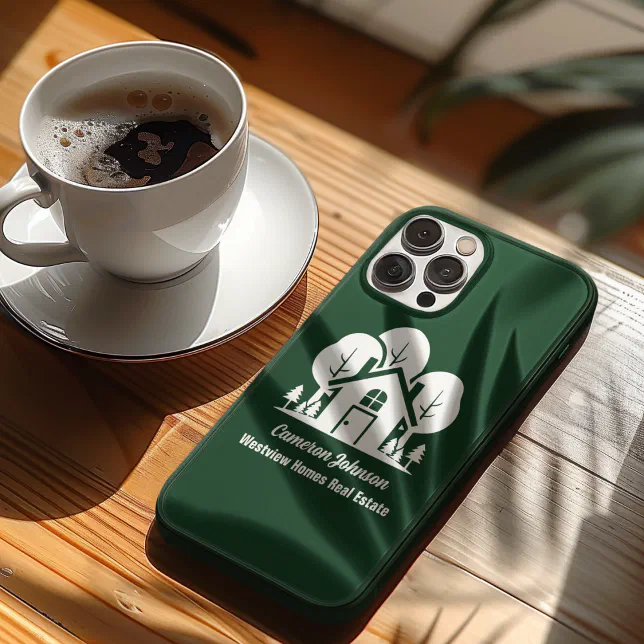 A green phone case rests on a wooden table with a cup of coffee beside it.