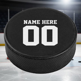 Custom hockey puck with jersey number and name