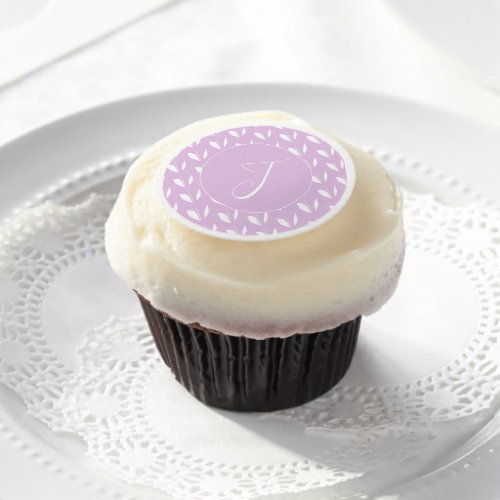 Custom initial white silhouette leaves purple edible frosting rounds