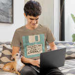 Custom Message Computer Floppy Disk T-Shirt<br><div class="desc">Remember floppy disks? This t-shirt is a blast from the past with it's illustration of a light blue computer floppy disc. Use the template fields to easily add your own message to the disk's label area. This tee shirt coordinates with other items in our Old Tech collection from Asterisk Designs....</div>