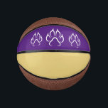 Custom Mini Basketball<br><div class="desc">Custom mini basketball is shown here with color accents of purple and gold with a dog paw print.
Customize your own or buy as is. You can also change the colors on this item to whatever you want, just customize.
Licensed Print</div>