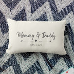 Custom Modern Mommy & Daddy New Parents Gift Lumbar Pillow<br><div class="desc">Celebrate the birth of your child with this chic farmhouse style throw pillow featuring your names and year establised in a charcoal vintage typewriter lettering and script design alongside sweet hand-drawn arrowsand heart. Choose your own background color! This would make the perfect gift for a new parents at a baby...</div>