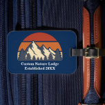 Custom Mountain Sunset Nature Retreat Travel Lodge Luggage Tag<br><div class="desc">This awesome sunset over rocky mountains in nature makes a great image for custom marketing for a campsite business or nature retreat company in the woods or forest. Just add your own corporation or store and the year with our personalization tool plus your established date on this cool blue luggage...</div>