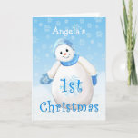 Custom Name 1st Christmas Snowman Greeting Holiday Card<br><div class="desc">Cute little snowman wearing blue winter hat, scarf and mittens as delicate snowflakes fall through the winter sky is a delightful Christmas design for baby's first Christmas greeting card. Personalize the name on card front and inside verse using the template provided. We specialize in custom-made designs, contact us if you...</div>