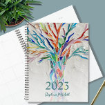 Custom Name 2023  Planner<br><div class="desc">This unique Planner is decorated with a brightly coloured mosaic tree. Customize it with your name and year. To edit further use the Design Tool to change the font, font size, or color. Because we create our artwork you won't find this exact image from other designers. Original Mosaic © Michele...</div>