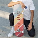 Custom Name Cool Retro Sunset Stripes  Skateboard<br><div class="desc">Custom Name Cool Retro Sunset Stripes Skateboard features your personalized name on a retro sunset stripes in burgundy, orange, yellow and blue on a wooden background. Personalize by editing the text in the text box provided. Give a custom made gift, personalized skateboard to your favorite skateboarder for Christmas, birthday or...</div>
