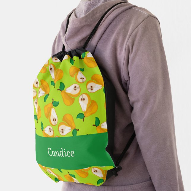 Custom name orange pears on green drawstring bag (Insitu)