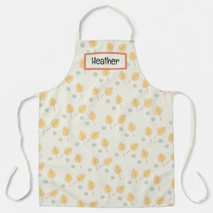 Custom name orange tropical leaves cream apron