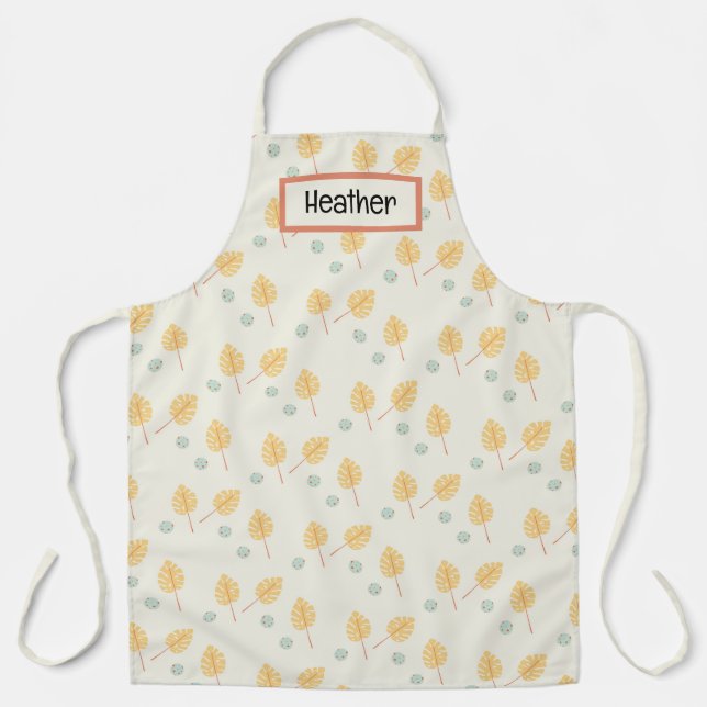 Custom name orange tropical leaves cream apron (Front)
