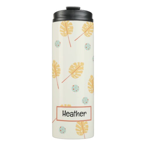 Custom name orange tropical leaves cream thermal tumbler