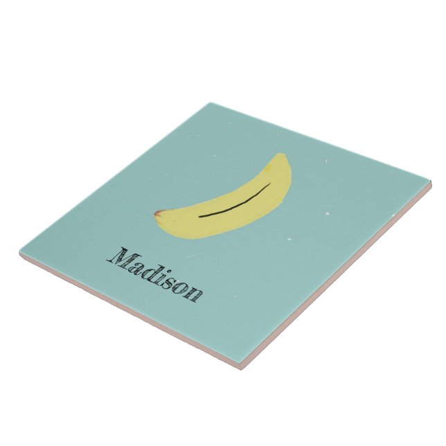Custom name painted banana on blue ceramic tile (Side)