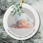 Custom Name Photo Babys First Christmas Watercolor Ceramic Ornament<br><div class="desc">This Baby's First Christmas Ornament is decorated with watercolor mistletoe.
Easily customizable with your baby's photo,  name,  and year.
Use the Design Tool to change the text size,  style,  or color.
Because we create our artwork you won't find this exact image from other designers.
Original Watercolor © Michele Davies.</div>