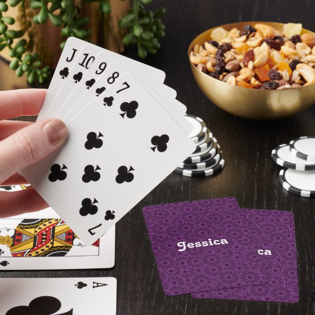 Custom name purple flowers on black poker cards (In Situ)