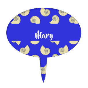 Custom name shells on blue cake topper