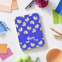 Custom name shells on blue iPad pro cover