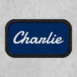 Custom name white dark blue or any color patch<br><div class="desc">Your name or text in a retro script font. Default colors are white text on a dark blue background but this can be changed in the design tool.</div>