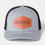 Custom Personalized Name Groomsman Leather Patch Hat<br><div class="desc">Celebrate your crew with this custom groomsman hat, featuring a rugged, hexagon-shaped leather patch that adds a rustic-industrial edge to any wedding party ensemble. The vintage-inspired design showcases "GROOMSMAN" in bold typography, along with a customizable date at the top for commemorating the bachelor party weekend or the wedding day itself....</div>