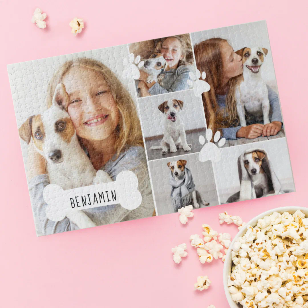 Custom pet photo collage jigsaw puzzle with dog bone and paw print design next to some popcorn.