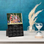 Custom Photo and Name 2025 Calendar Black Tabletop Plaque<br><div class="desc">Keep the people you love nearby with a personalized 2025 calendar tabletop plaque. Replace the sample photo and name with your own in the sidebar. The custom text is in a modern white script font. Below it is an easy to read white 2025 calendar on a black background. Makes a...</div>
