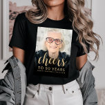 Custom Photo Cheers 90th Birthday Party Tri-Blend Shirt<br><div class="desc">This 90th birthday party t-shirt features the guest of honor's photo with a gold-colored text overlay. The word "cheers" appears in elegant gold-colored calligraphy script, followed by "to 90 years" and the guest of honor's name and birthday in sans serif font. A dark screen helps make the text pop. A...</div>