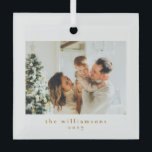 Custom Photo Christmas Minimalist Simple Family Glass Ornament<br><div class="desc">Celebrate the joy of the season with this custom photo Christmas glass ornament, designed for the minimalist at heart. Featuring a clean, simple layout, your family photo takes center stage on a sleek glass backdrop, making it a timeless addition to your holiday decor. The modern yet understated design allows your...</div>