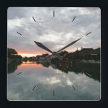 Custom Photo Personalized Square Wall Clock<br><div class="desc">Introducing Sunset in Switzerland, a stunning photographic clock perfect for bringing a tranquil atmosphere to your home. This photo takes you on a journey to the beautiful and peaceful city of Solothurn, located in scenic Switzerland. Enjoy the serene beauty of this picturesque evening sunset as it reflects off the glassy...</div>