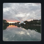 Custom Photo Personalized Square Wall Clock<br><div class="desc">Introducing Sunset in Switzerland, a stunning photographic clock perfect for bringing a tranquil atmosphere to your home. This photo takes you on a journey to the beautiful and peaceful city of Solothurn, located in scenic Switzerland. Enjoy the serene beauty of this picturesque evening sunset as it reflects off the glassy...</div>