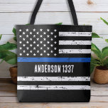 Custom Police Officer Thin Blue Line Personalized Tote Bag<br><div class="desc">Introducing our new Thin Blue Line Flag Tote Bag, perfect for police officers, police moms, police wives, policewomen, and anyone who wants to show their support for law enforcement. Designed in a distressed vintage style, this tote bag features the American flag with a striking Thin Blue Line that represents the...</div>