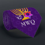 Custom Purple Monogram HANUKKAH Neck Tie<br><div class="desc">Elegant, stylish purple HANUKKAH Neck Tie, designed with faux gold menorah, colorful Star of David and silver colored dreidel plus CUSTOMIZABLE MONOGRAM and GREETING, so you can add your initials and create your own greeting. There is a subtle tiled pattern of the Star of David in the background. Similar versions...</div>
