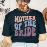 Custom Retro Mother of the Bride Wedding Party T-Shirt<br><div class="desc">Inject a dash of fun into your wedding party with our exclusive Retro Groovy Back Print Collection. Designed for people with a whimsical and non-traditional fashion sense, our collection boasts a wide array of matching retro outfits. Ideal for the bride, bridesmaid, and even the mother of the bride. These groovy...</div>
