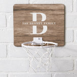 Custom Rustic Farmhouse Family Monogram Name Wood Mini Basketball Hoop<br><div class="desc">This Modern, Rustic mini basketball hoop features your family monogram and name over a faux medium brown wood backdrop in a Retro Cool Typography Design. Customize with your family name and initial and make this your own unique summer game set for the farmhouse style lake house, family cottage or cabin....</div>