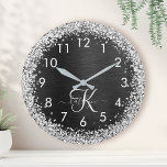 Custom Silver Glitter Black Sparkle Monogram Round Clock<br><div class="desc">Easily personalize this trendy elegant clock design featuring pretty silver sparkling glitter on a black brushed metallic background.</div>