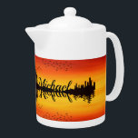 Custom Sunset Reflection Landscape with Name Teapot<br><div class="desc">Celebrate natural beauty and personal style with this stunning sunset reflection landscape featuring vibrant skies, silhouetted trees, and graceful flying birds mirrored across tranquil water. This customizable artwork allows you to add your name for a unique touch, making it a meaningful keepsake or standout décor piece. The warm orange and...</div>