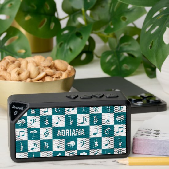 Custom teal and white music notes and instruments bluetooth speaker