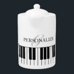 Custom teapot with black & white grand piano keys<br><div class="desc">Custom teapot with black & white grand piano keys. Elegant monogram for family name or quote. Unique Birthday gift ideas for musician,  piano player,  pianist,  friends,  family,  teacher,  co worker etc. Stylish script typography template.</div>