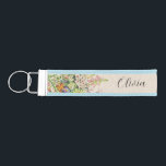 Custom Wildflower Floral Script Name Wrist Keychain<br><div class="desc">Keep your keys close and your style personal with our Custom Wildflower Floral Script Name Wrist Keychain. Featuring a delicate botanical green wildflower design and your name in elegant script, this keychain adds a functional, fashionable touch to everyday essentials. Perfect for students, dorm living, or on-the-go lifestyles, it’s a beautiful...</div>