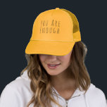 Custom You are Enough Inspirational Quote Trucker Hat<br><div class="desc">Spread positivity and remind yourself or others that “You Are Enough” with this fully customizable trucker hat! Featuring whimsical hand-lettering, this inspirational quote can be personalized to display your own motivational words or a name, making it a one-of-a-kind accessory. The breathable mesh design and adjustable fit ensure comfort for everyday...</div>