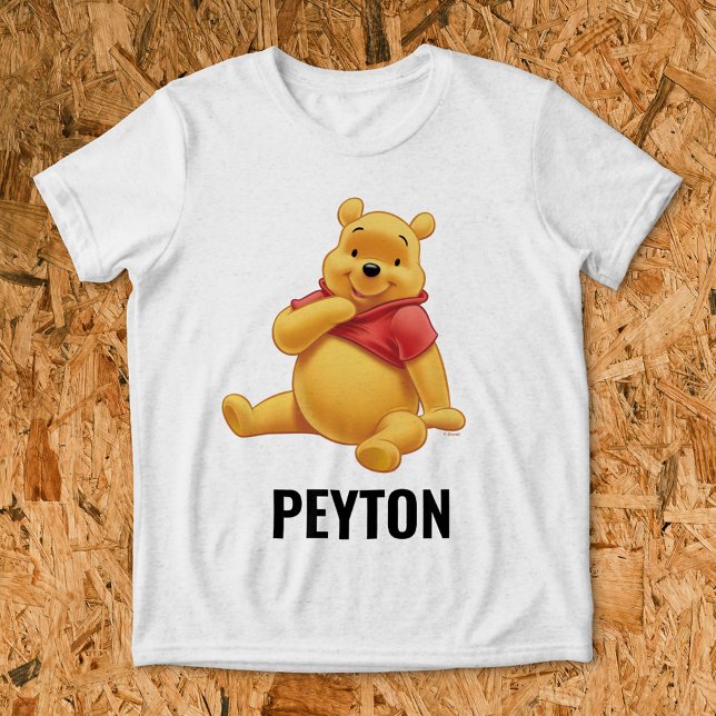 Customizable Disney's Winnie the Pooh Sitting Tri-Blend Shirt (Shirt on background)