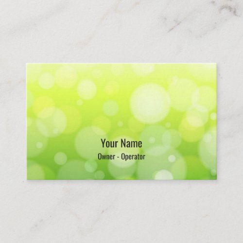 Customizable green bokeh business card