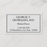 This classy, customizable, and simple business card design features a light gray background, and a double-line black border. It could be used by a professional such as a medical doctor, medical specialist, dermatologist or neurologist. The name, profession and contact details can be personalized.