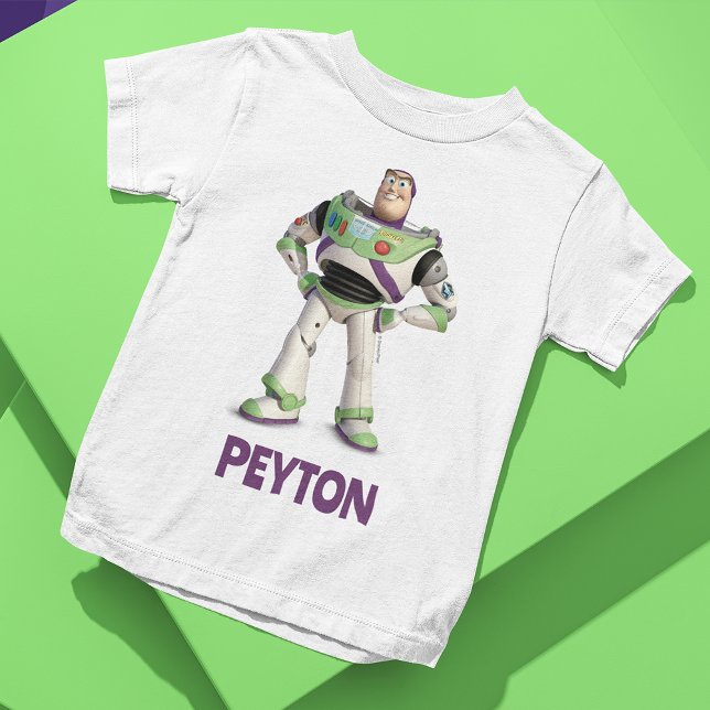 Customizable Toy Story's Buzz Lightyear Tri-Blend Shirt (Shirt on table)