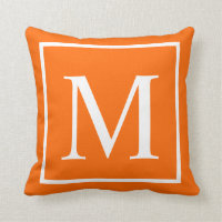 Customize monogram on bright orange throw pillow