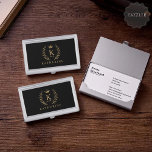 Customize Name & Initial Black White Gold Monogram Business Card Case<br><div class="desc">Introducing our Customize Name & Initial Black White Gold Monogram collection – a bespoke fusion of sophistication and personalization. Tailored for those who appreciate unique details, this collection allows you to add your name and initials to a timeless black and white palette, elegantly accented with gold monogramming. Whether you're looking...</div>