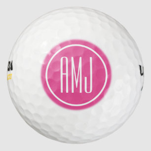 Customize pink and white monogram golf balls