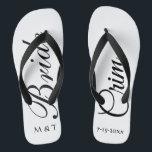 Customized Bride Elegant White Flip Flops<br><div class="desc">Customized Bride Elegant White Flip Flops Have fun after your wedding in a pair of stylish modern bride flip flops. "Bride" in large black script on white background with first initial of bride and groom names. Last name and wedding date customized on right shoe. Great fashion choice for casual wear...</div>