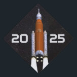 Customized SLS Space Rocket Graduation Cap Topper<br><div class="desc">The new SLS or Space Launch System is the most powerful rocket system ever built for NASA. It’s thrust is greater than either the Saturn V or Space Shuttle, with missions to the Moon, Mars and beyond. It symbolizes the limitless possibilities of the future, much like graduation does for students...</div>