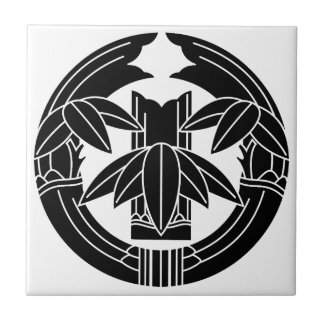 Cut bamboo in embracing bamboo leaves ceramic tile