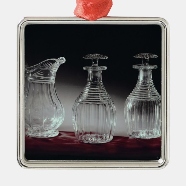 Cut glass decanters and jug, c.1840 metal ornament (Front)